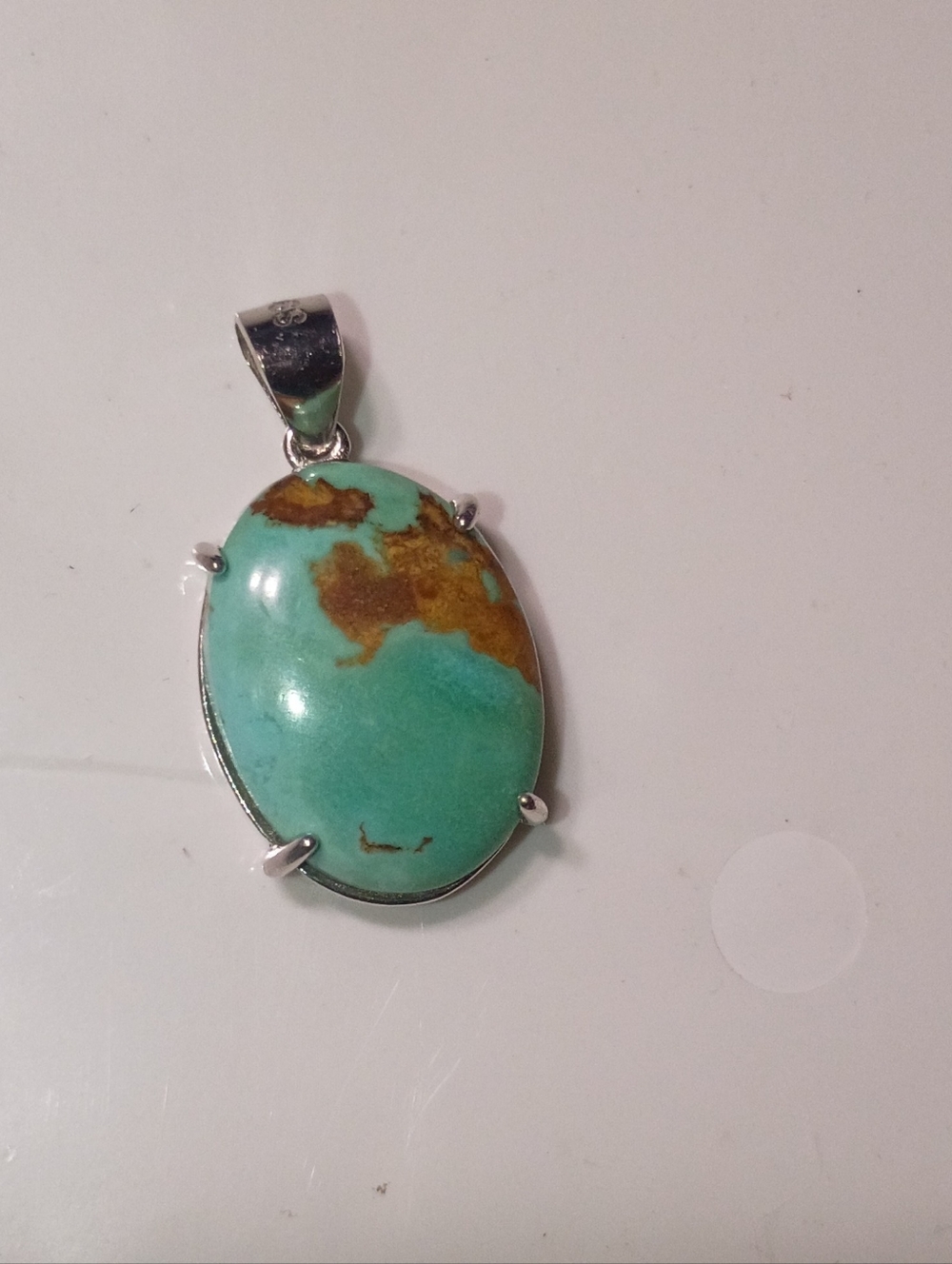Sterling Silver Turquoise Oval Pendant -Blue with Brown Matrix